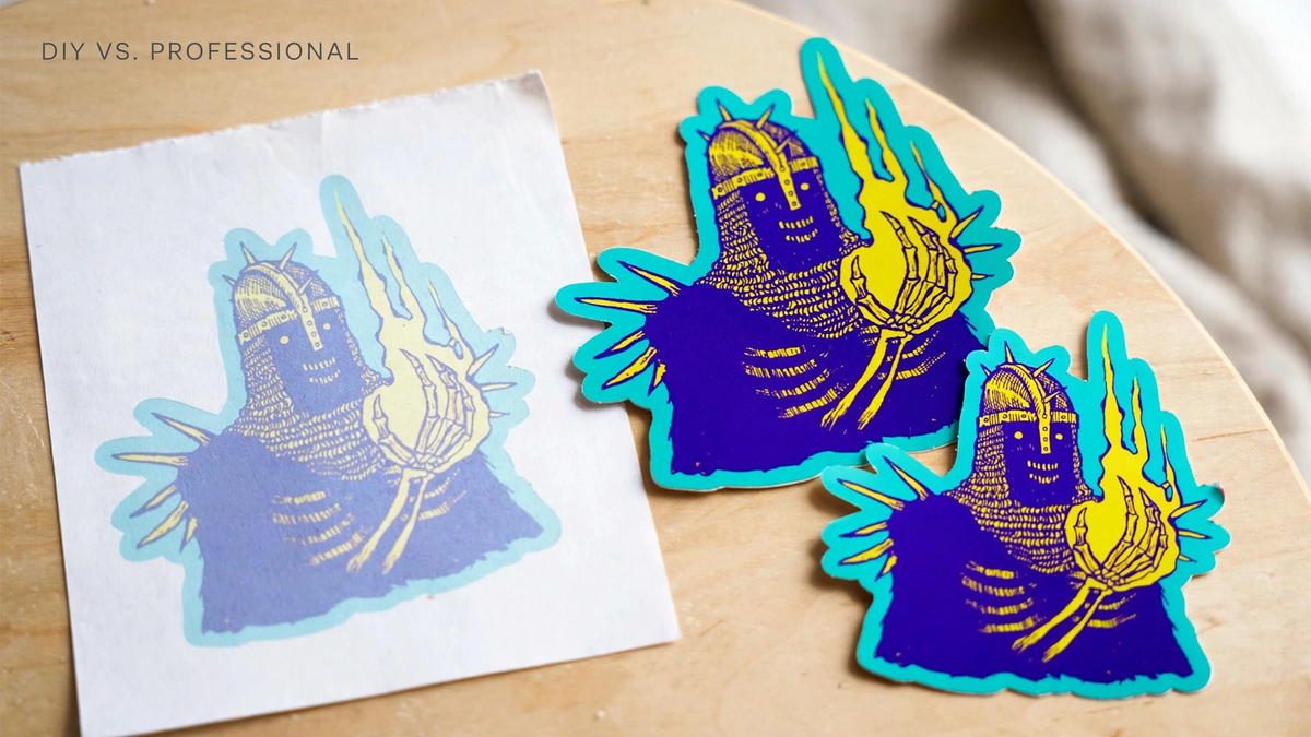 A dull home-printed sticker sheet beside vibrant professionally printed die-cut stickers.
